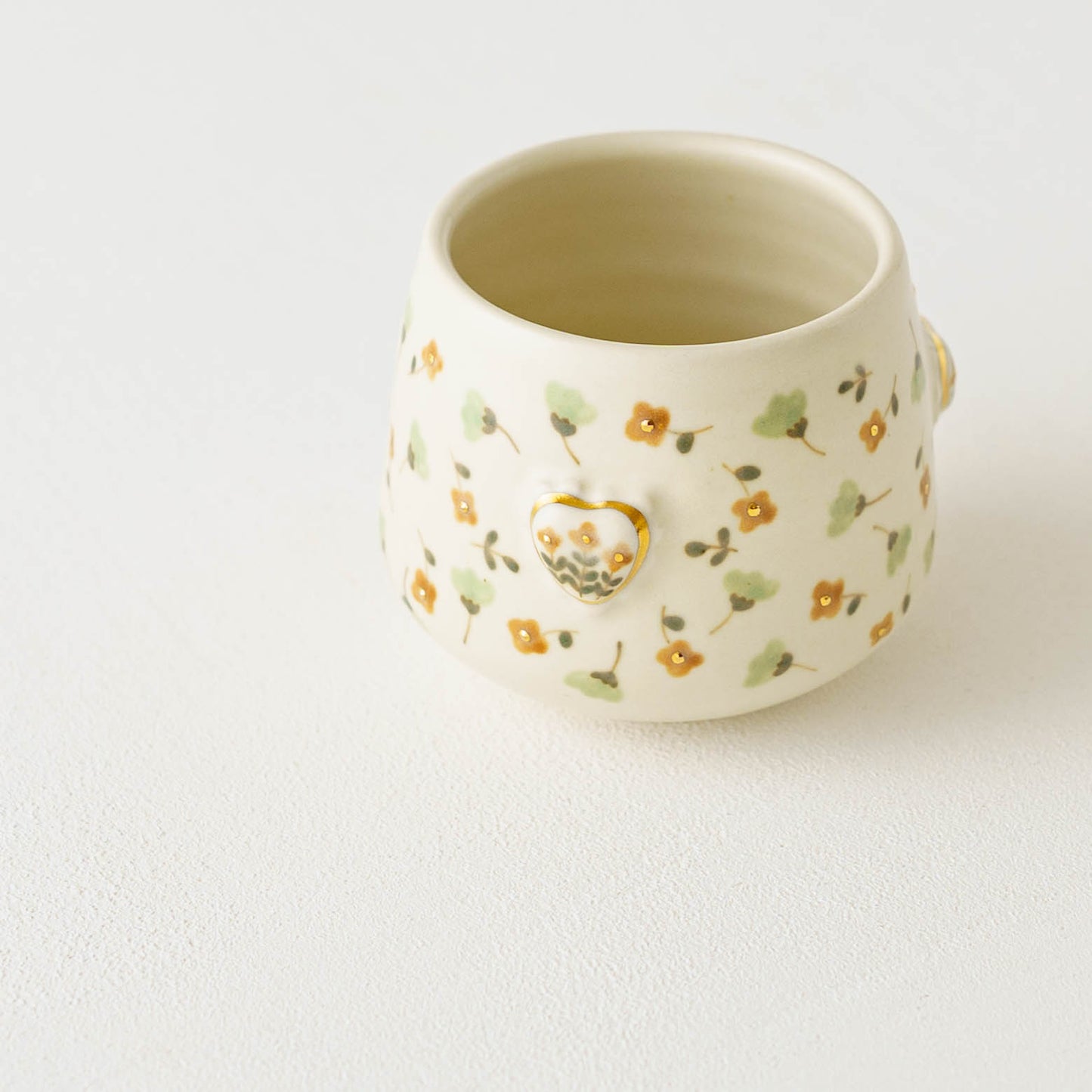 金彩レリーフカップ オレンジ x 薄緑|荒井彩乃