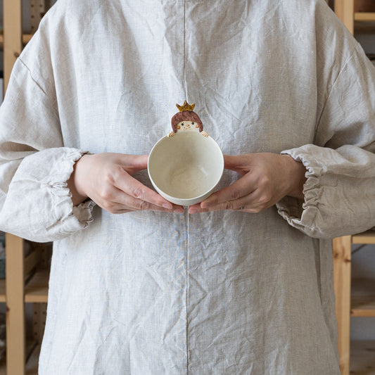 やさし顔の女の子のカオにほっこりする山田裕恵さんのヨーグルトカップ