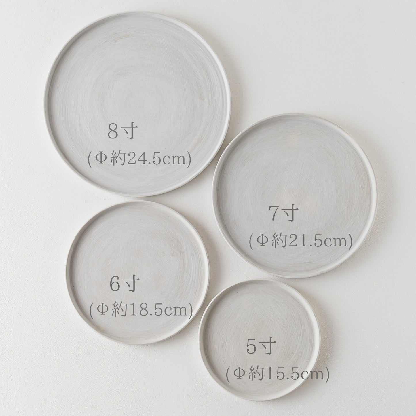 児玉修治さんのラウンドプレートカンヴァス