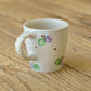 マグカップ　ちょうちょ　オフホワイト （グリーン x パープル）｜原田晴子