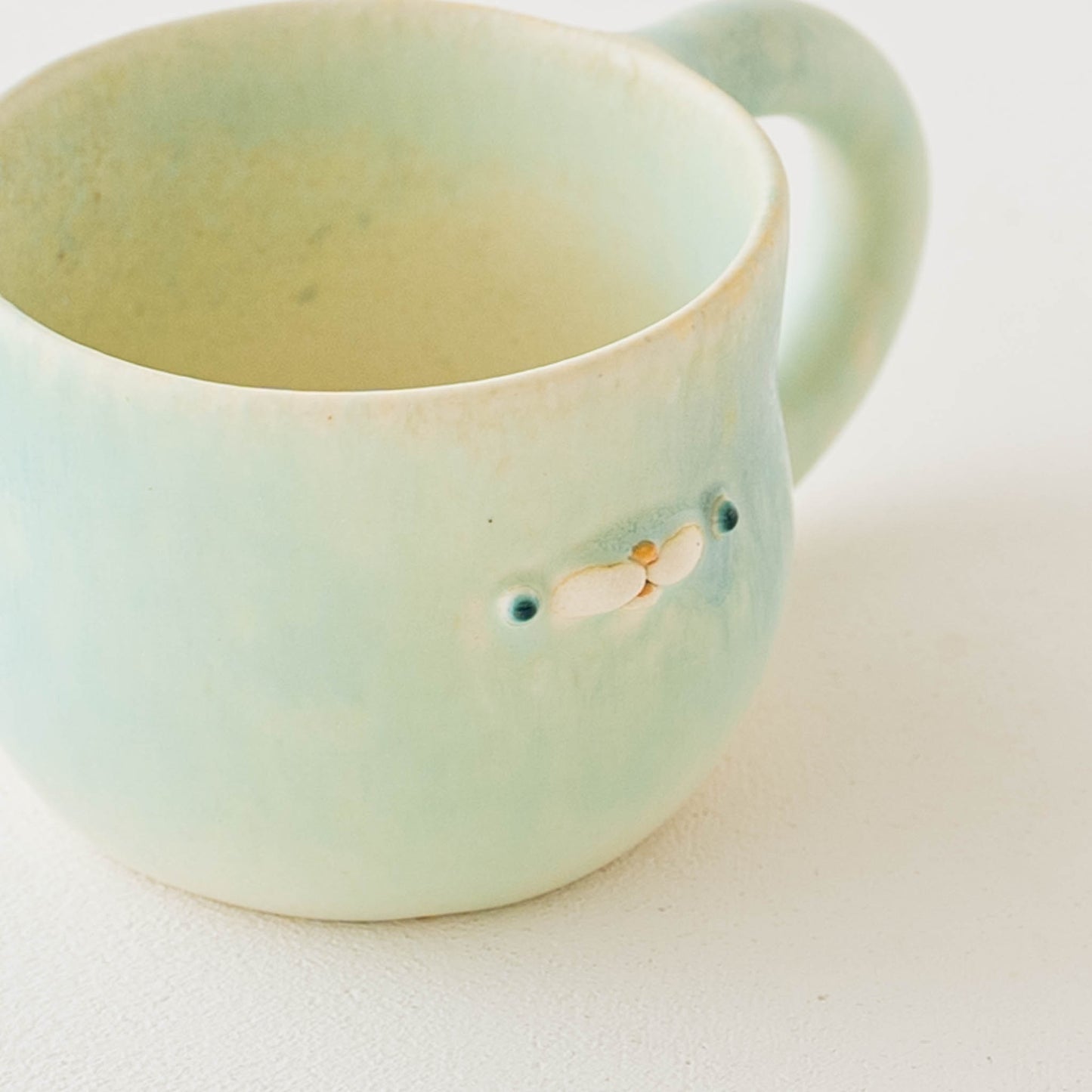 Ponpoco mug green | Ryoko Horie