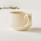 温もりを感じるやさしい白が素敵なyoshida potteryのコーヒーカップ