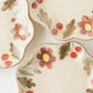食卓を楽しく明るくしてくれる森野奈津子さんの花模様の花型皿